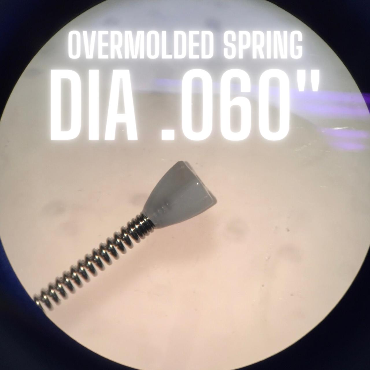 Overmolded spring .060 dia under microscope